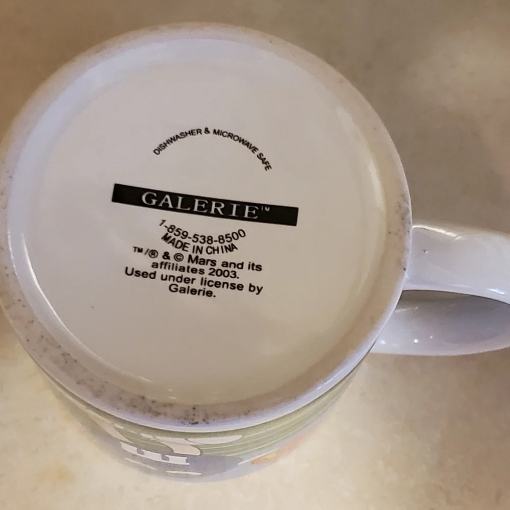 M&M coffee mug by Galerie cheerleader football